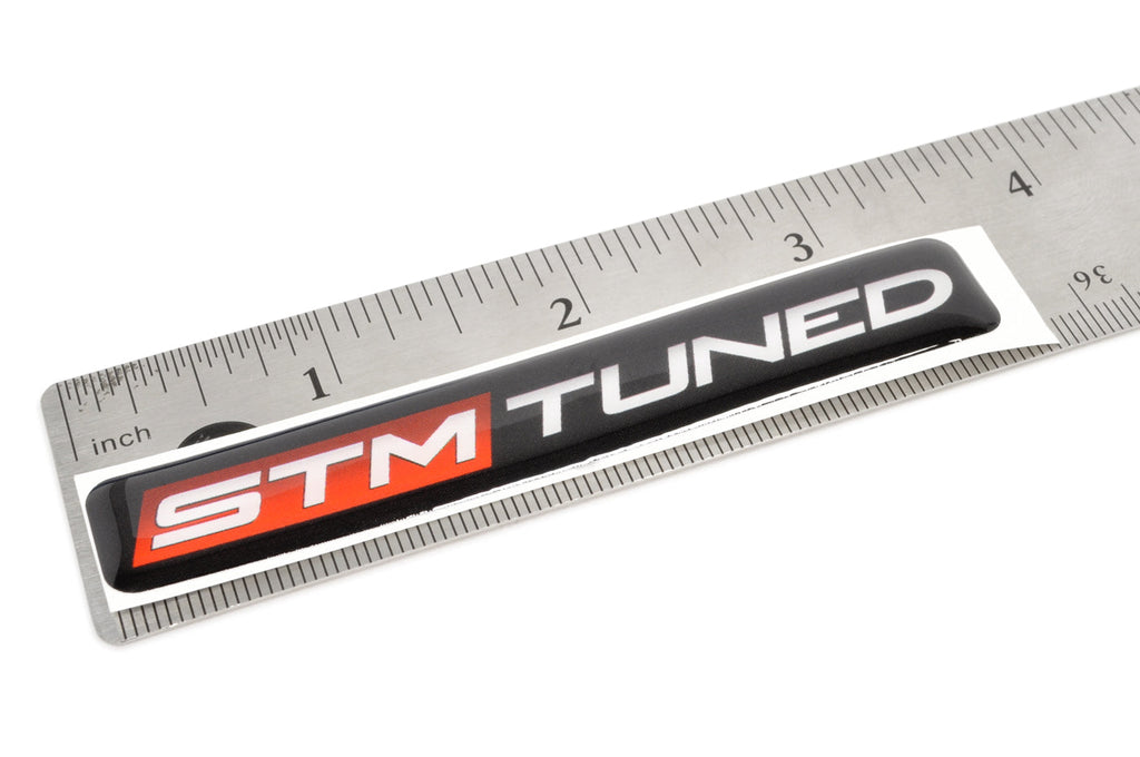 STM Tuned Badge